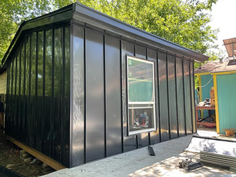 Black standing seam metal wall panels for Metal Roof Installation in Horace