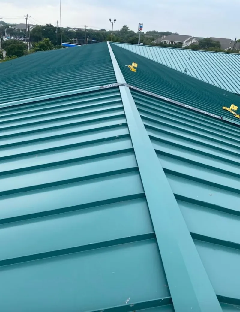 Green commercial metal roof ridge and valley for Metal Roof Repair in Horace