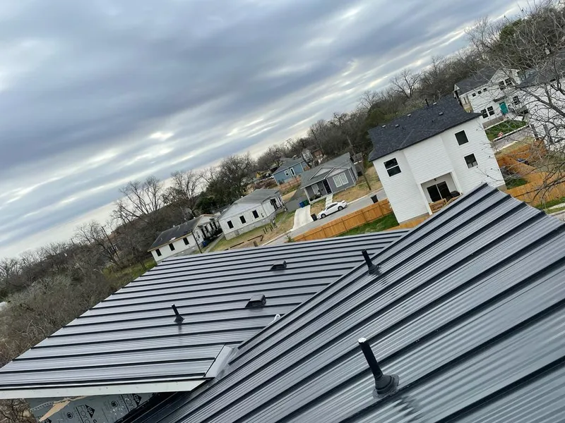 Standing seam metal roof panels with vents for Skylight Repair in Horace